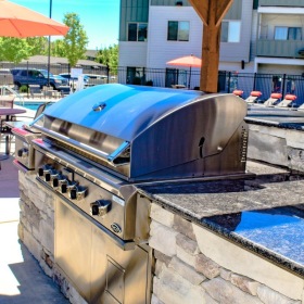 a grill by a pool area